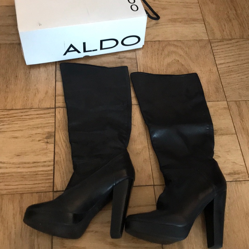 Black leather high heel boots